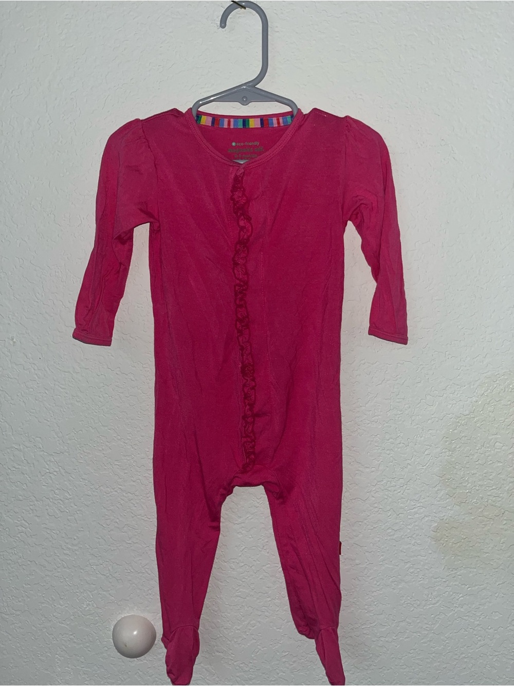 Magnetic Me fuscia bright pink ruffled footie pajamas